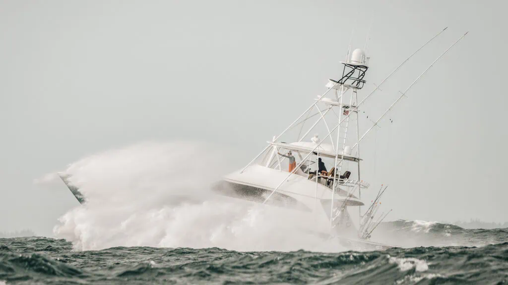 fishing boat in rough waves